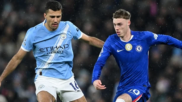 Rodri and Cole Palmer compete in midfield