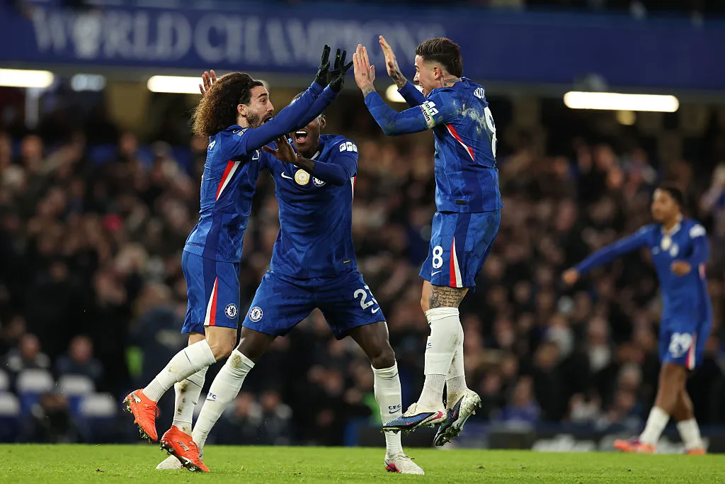 Cucurella celebrates a goal with his teammates at Chelsea