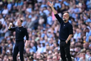 Manchester City's Guardiola alongside Crystal Palace's Oliver Glasner