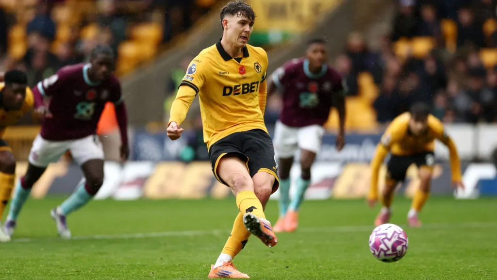 Jorgen Strand Larsen scores from the penalty spot during a Premier League match