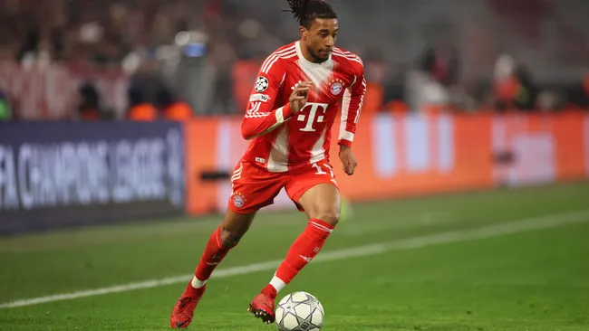 Olise controls the ball during the Champions League match