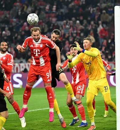 Harry Kane Brace Fires Bayern Munich Into Champions League Knockouts; Striker Reaches 34 Goals for the Season