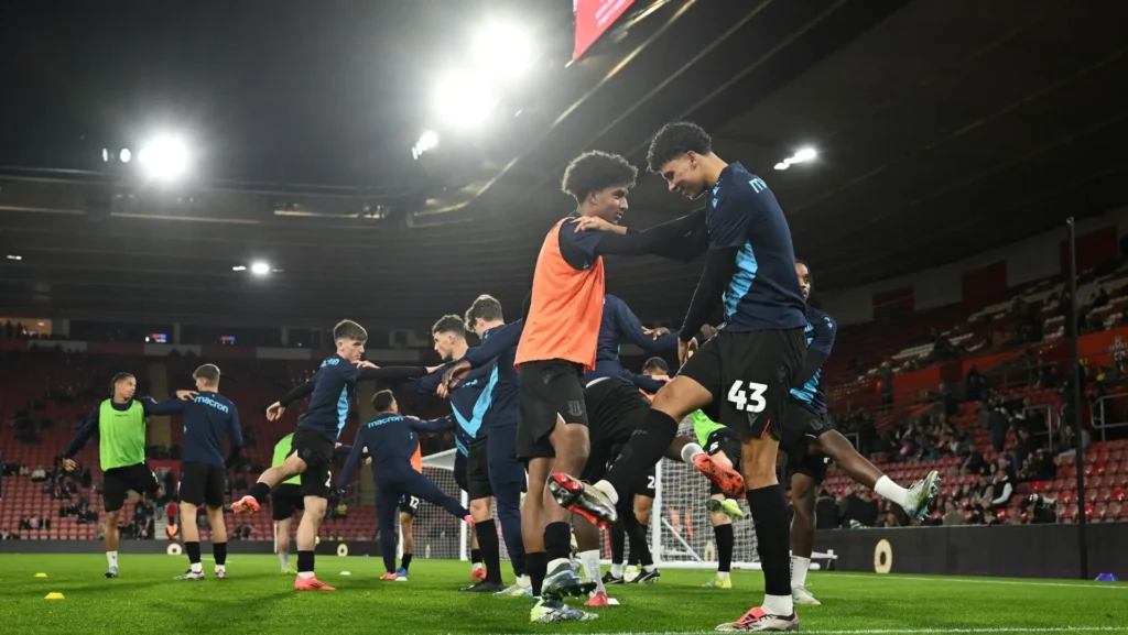 Jaden Dixon warms up before the Carabao Cup match