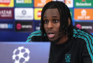 Anfield Showdown: Frimpong Ruled Out as Arne Slot Considers Bold Szoboszlai Move for Man City Clash