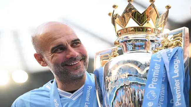 Guardiola, in 2024, with the Premier League trophy 